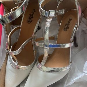 Women’s white and silver heels